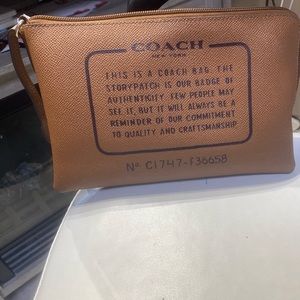 Coach Clutch Story Patch Pouch